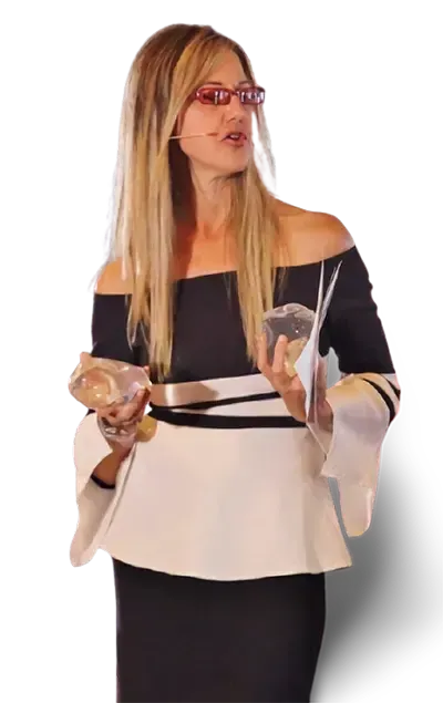 TK speaking at an event in an original HairDoc TK photograph